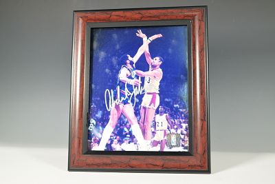 Kareem Abdul-Jabbar Signed Photograph, Lakers vs. Bucks. A framed color photograph of Kareem