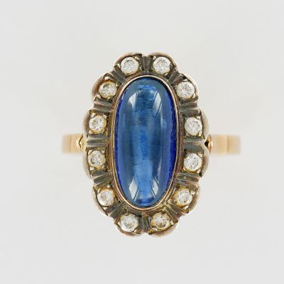 14k Gold Ring with Cabochon Sapphire and Diamond Halo. An elegant 14k yellow gold ring