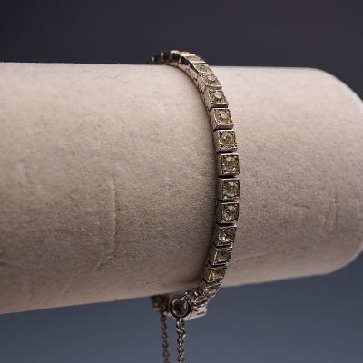 Vintage Otis Sterling Silver Tennis Bracelet with Round-Cut Stones. This vintage sterling silver