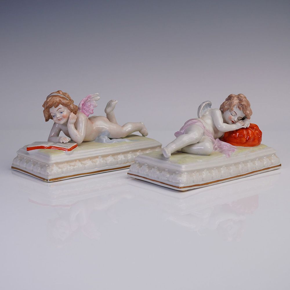 Pair of Scheibe Alsbach German Porcelain Putti Figurines. Delightful pair of German porcelain 