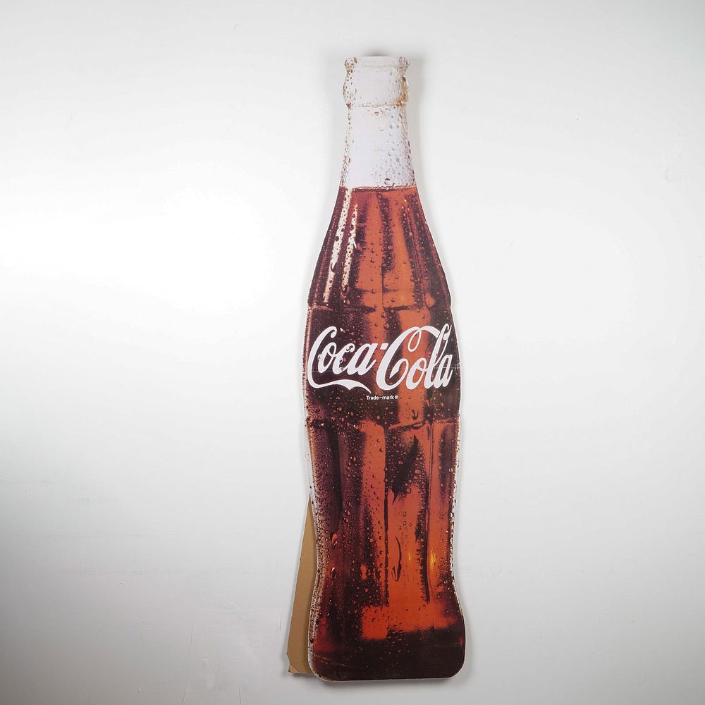 Coca-Cola Bottle-Shaped Cardboard Standee. Oversized Coca-Cola advertising standee in the shape 