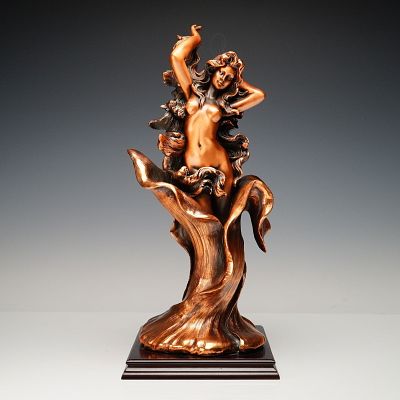Bronze Female Nude Figure on Wood Base. A sinuous and elegant bronze sculpture depicting a