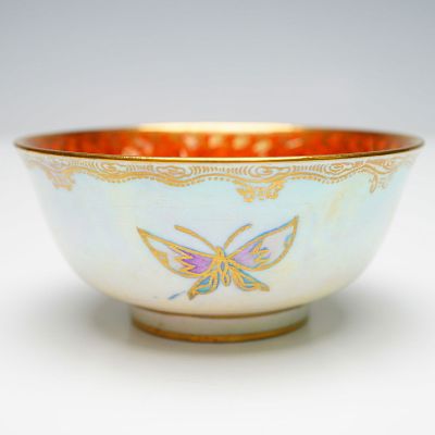 Wedgwood Fairyland Lustre Boston Cup, Butterflies Z4832. The exterior is decorated in a