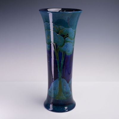 Moorcroft Pottery Trumpet Vase, Moonlit Blue. A cylindrical trumpet vase by William Moorcroft in