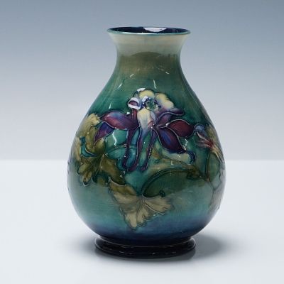 Moorcroft Pottery Vase, Columbine. Crafted with hand-applied tubelined slip, this vase features