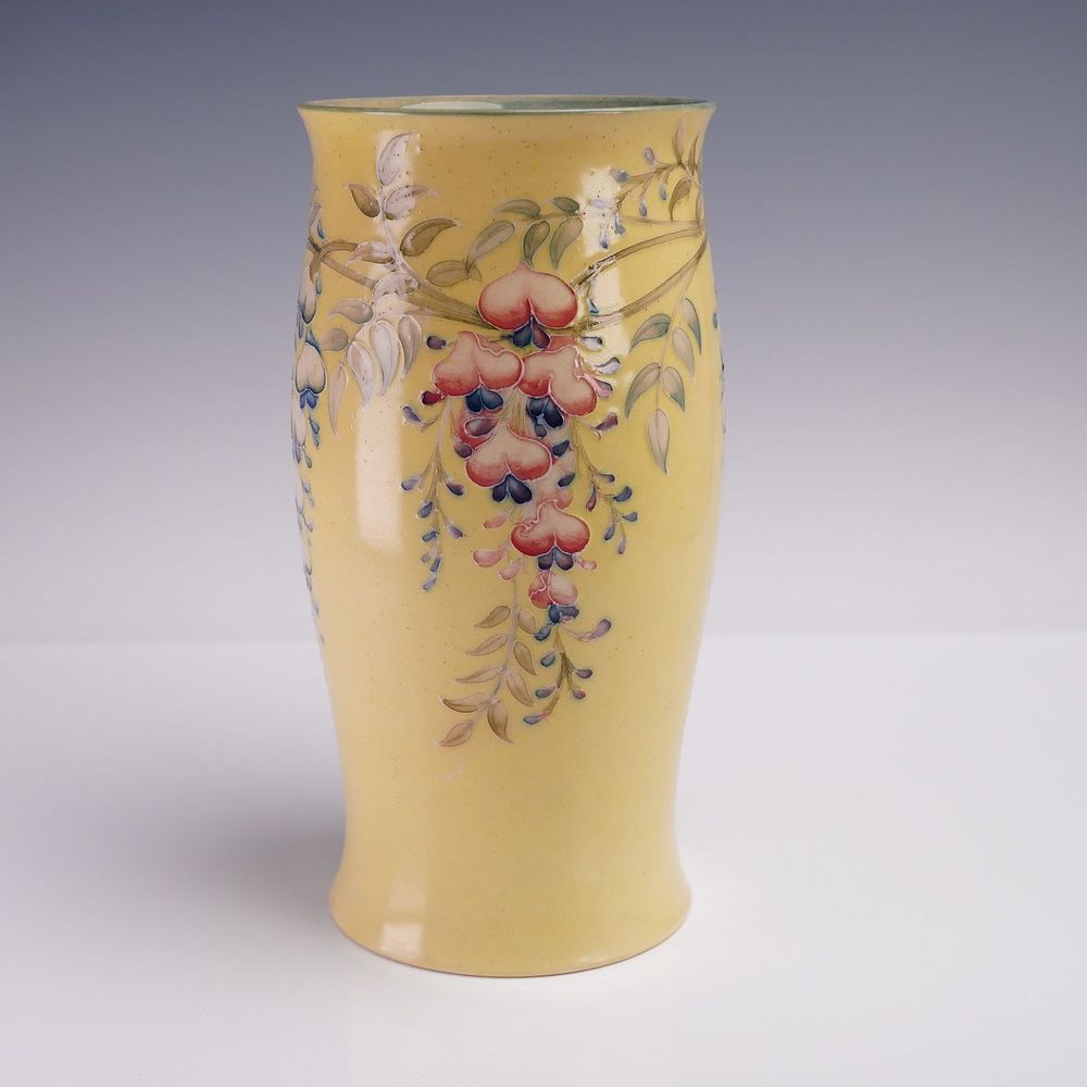 Liberty & Co. by William Moorcroft Pottery Vase, Wisteria. A hand-decorated pottery vase by 