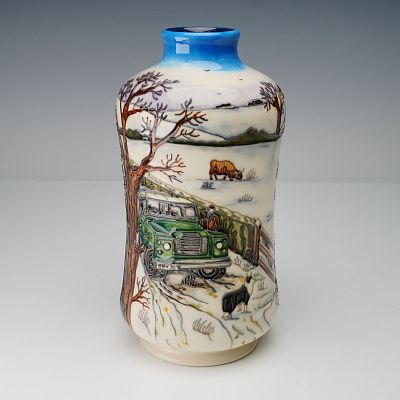 Moorcroft Pottery by Anji Davenport Vase, Winter's Feed. The vase showcases a continuous raised