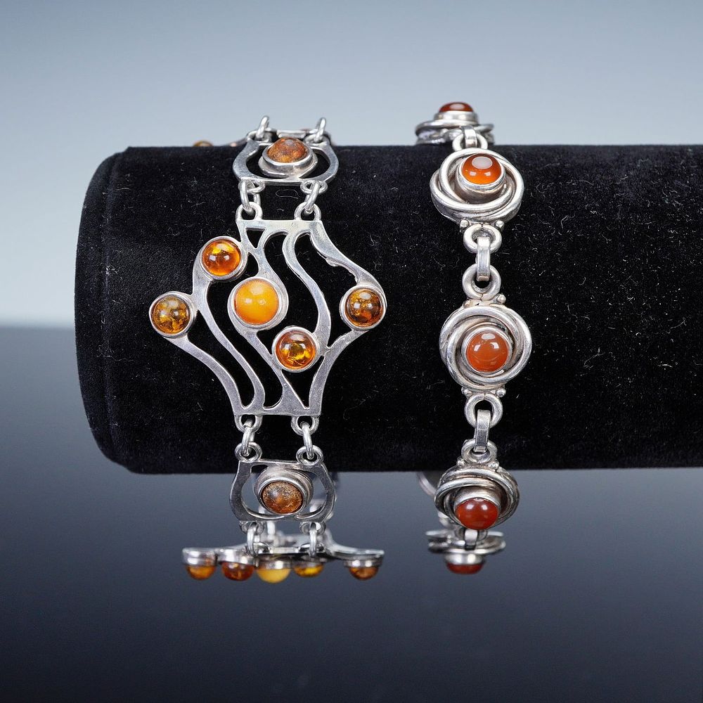 2pc Sterling Silver Amber Cabochon Bracelets. Two sterling silver bracelets, each marked 925 