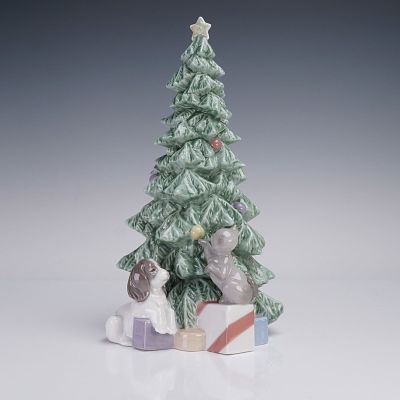 Nao by Lladro Christmas Figurine, Christmas Mischief 2001620. This charming hand-made piece from 