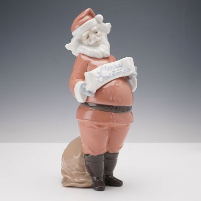 Nao by Lladro Figurine, Santa's Best Wishes 1399. This Nao by Lladro porcelain figurine, model 