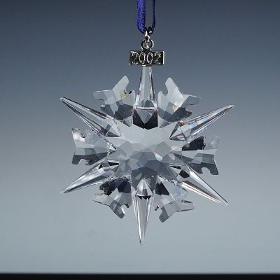 Swarovski 2002 Crystal Ornament. This exquisite crystal snowflake ornament features a radiant 