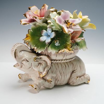 Capodimonte Porcelain Elephant with Flowers Sculpture. Capodimonte hand painted porcelain 