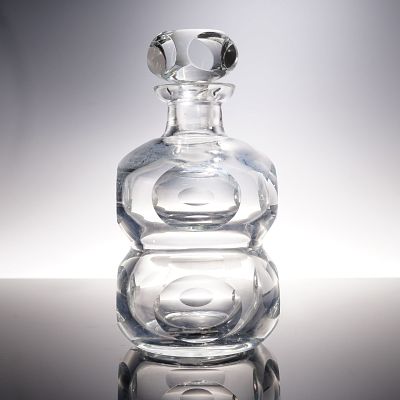 Cut Art Glass Decanter with Stopper. Clear glass decanter with rounded form featuring large cut 