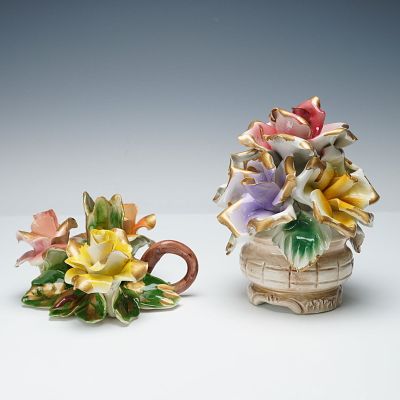 2pc Capodimonte Porcelain Floral Figurines. A colorful two-piece lot of Capodimonte porcelain 