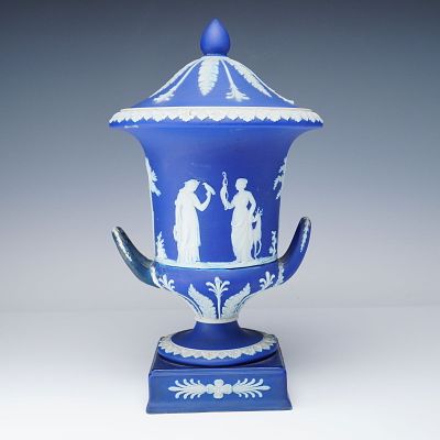 Wedgwood Blue Jasperware Covered Urn. Covered urn in dark cobalt blue jasperware with applied 