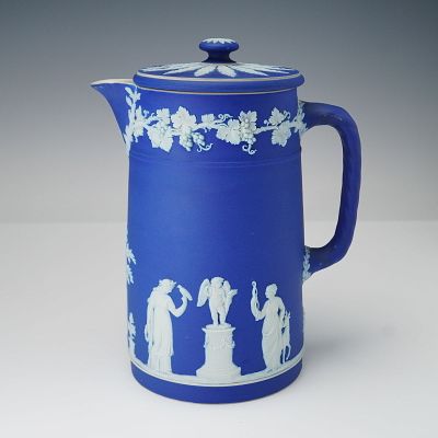 Wedgwood Blue Jasperware Lidded Pitcher. Wedgwood blue jasperware lidded pitcher featuring 