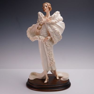 Amilcare Santini Sculpture, Lady with a Feathered Boa. Handcrafted porcelain sculpture depicting 