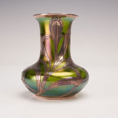 Loetz Art Glass Silver Overlay Bud Vase. A Loetz iridescent art glass bud vase with a green to 