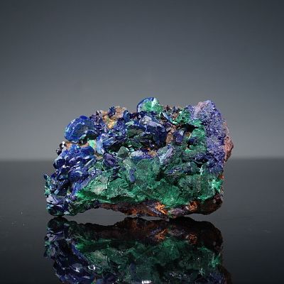 Azurite and Malachite Mineral Specimen on Iron Matrix. This specimen showcases a vivid interplay 