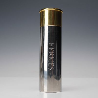 Vintage Hermes Metal Bullet Hip Flask. Featuring a sleek cylindrical design in polished 