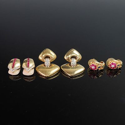 3 Pairs Gold-Tone Earrings with Floral and Geometric Designs. A vibrant trio of gold-tone 