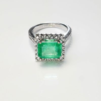 14K White Gold 2.54ct Emerald and 0.45ctw Diamond Ring. A striking 2.54 carat emerald cut 