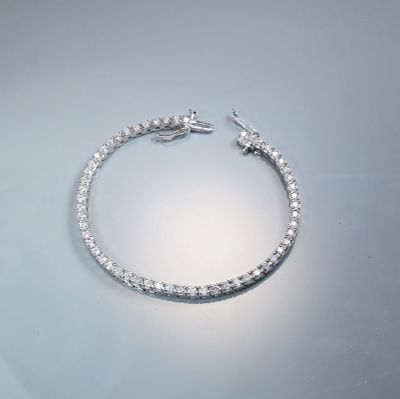 18K White Gold 2.00ctw Diamond Tennis Bracelet. A refined 18K white gold tennis bracelet set 