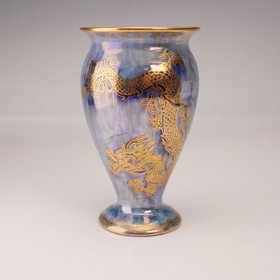 Wedgwood Fairyland Lustre Dragon Vase, Z4829. The exterior has a mixed-blue iridescent lustre 