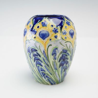 James Macintyre by William Moorcroft Florian Ware Peacock Vase. Ovoid form with raised and 