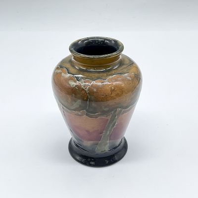 Early Moorcroft Pottery Vase, Eventide. A vase featuring Moorcroft's popular landscape pattern 