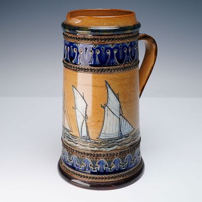 Doulton Lambeth by Edgar Wilson Stoneware Jug, Maritime. Tapering cylindrical body incised 