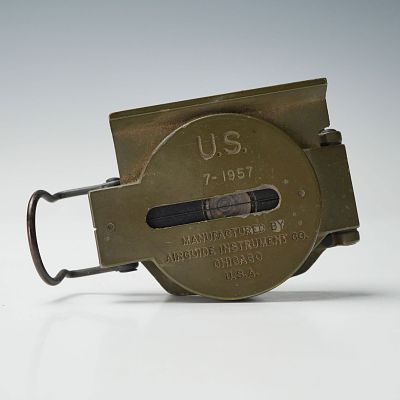 Airguide Instrument Co. Compass. A 1957 U.S. military lensatic compass made of olive-drab metal 