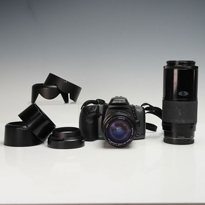 8pc Minolta Maxxum 530si RZ 35mm SLR Film Camera with Lenses & Accessories. This eight piece 