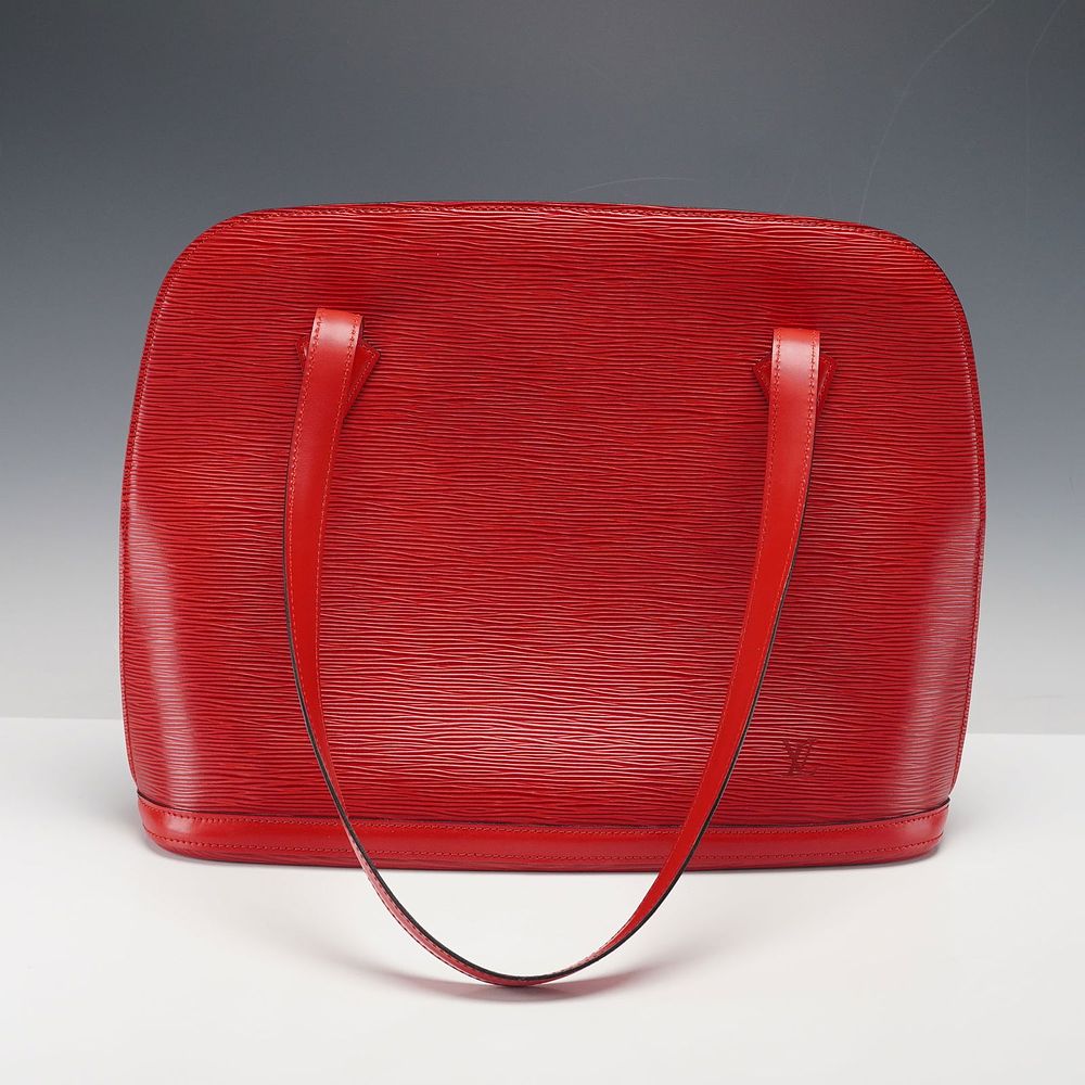 Louis Vuitton Tote Bag, Red Epi Leather. Crafted in Louis Vuitton's signature Epi leather, this 