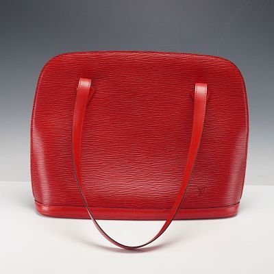 Louis Vuitton Tote Bag, Red Epi Leather. Crafted in Louis Vuitton's signature Epi leather, this 