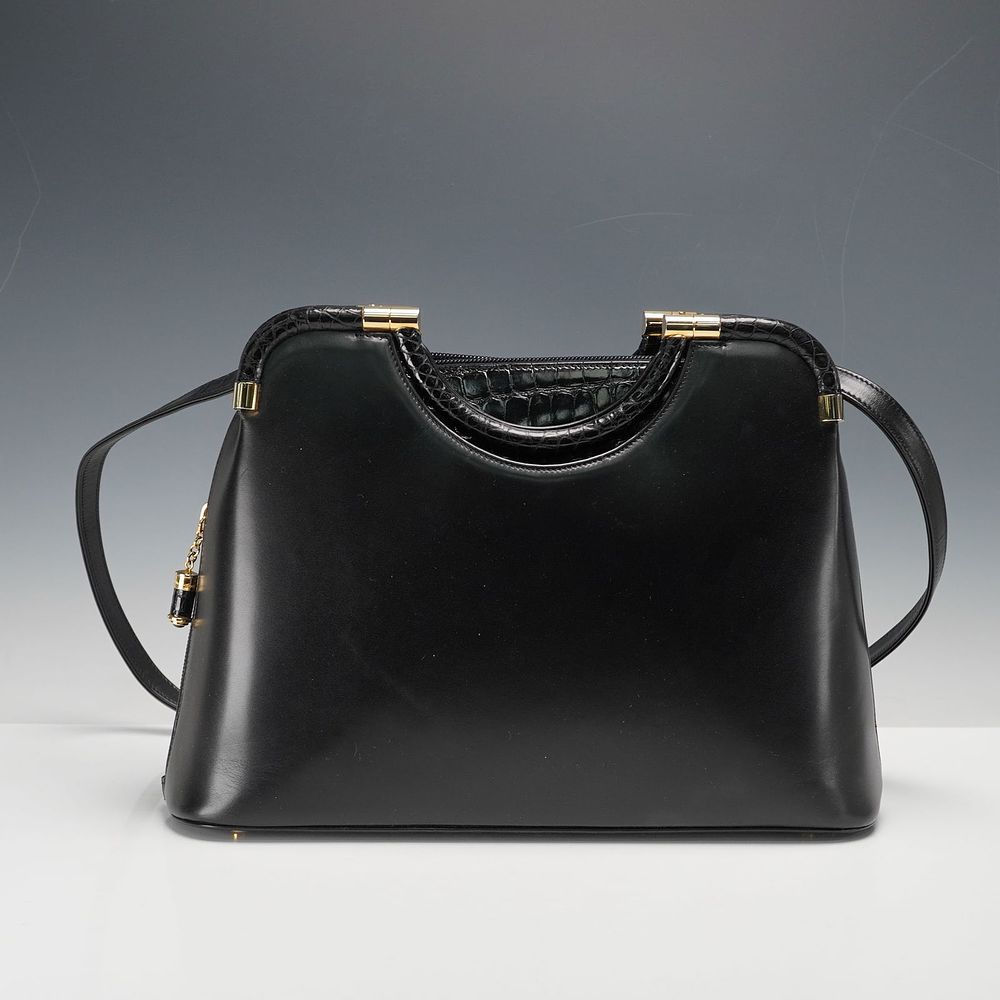 Judith Leiber Handbag, Black Leather with Crocodile Trim. This exquisite Judith Leiber handbag 