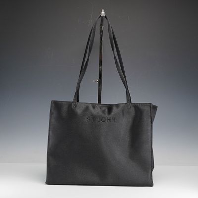 St. John Satin Embroidered Shoulder Bag. This elegant St. John shoulder bag is crafted from 