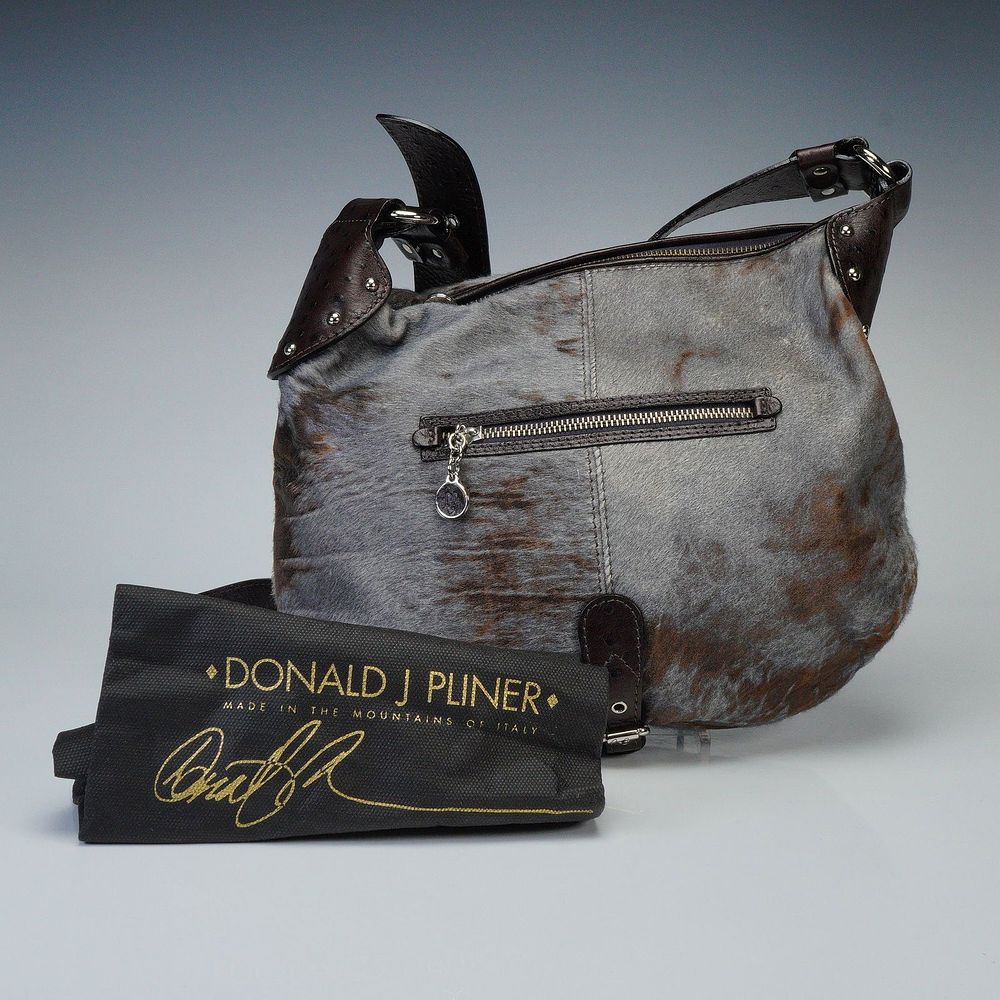 Donald J. Pliner Italian Haircalf & Leather Hobo Bag. Hobo bag crafted from dyed haircalf in a 