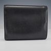 Prada Black Leather Wallet with Card Slots and Coin Pocket. This Prada wallet is made from Image - 1