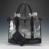 St. John's Clear Tote Bag with Black Leather Trim. This stylish and practical clear tote bag Image - 1