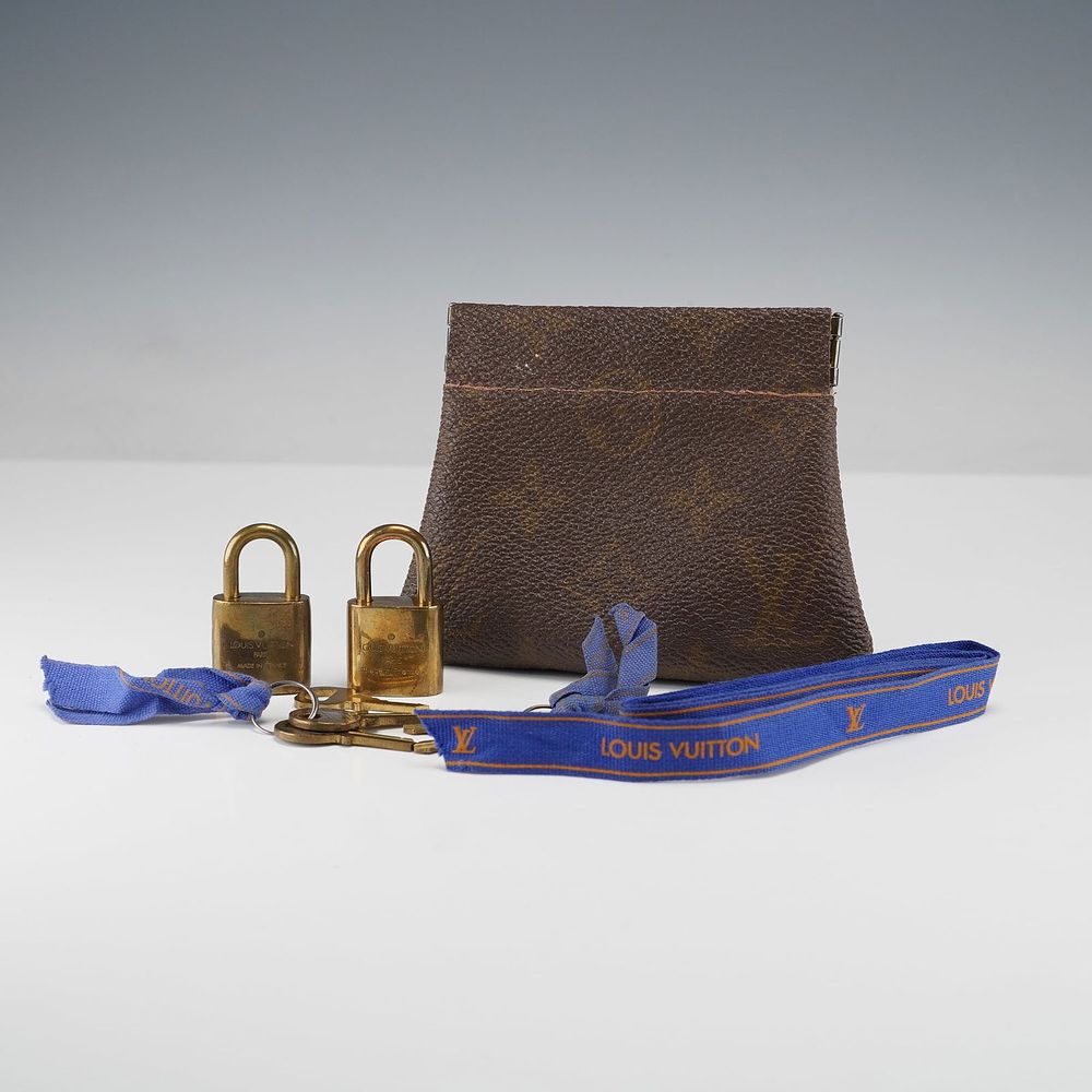 Louis Vuitton Monogram Lock & Key Set with Coin Purse. This Louis Vuitton set includes two 
