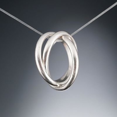 Tiffany & Co. Sterling Silver Triple Interlocking Rolling Ring. A Tiffany &amp; Co. sterling 
