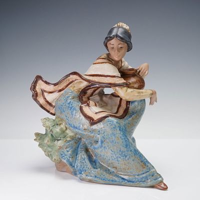 Lladro Gres Porcelain Figurine, Andean Country Girl 01012175. A young girl seated gracefully 