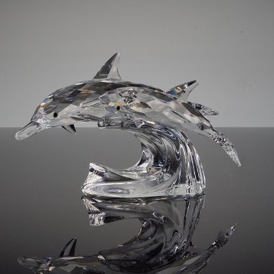 Swarovski Crystal Figurine, Lead Me. A brilliant multi faceted clear crystal sculpture depicting 