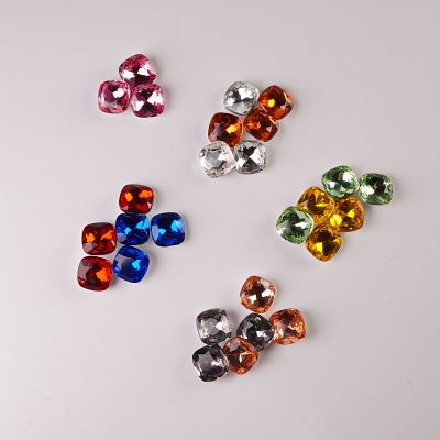 27pc Joan Rivers Faceted Multicolor Cushion Cut Stones. A 27-piece group of faceted cushion cut 