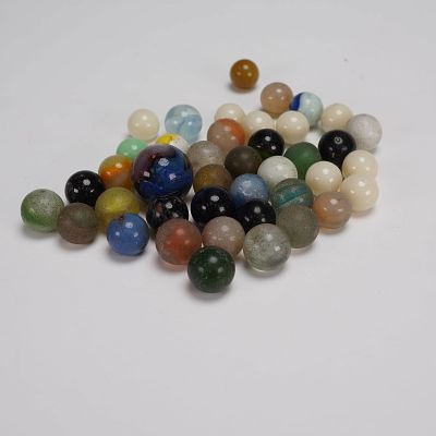 Collection of 38 Uranium and Mixed Glass Marbles. A colorful and varied lot of 38 vintage glass 