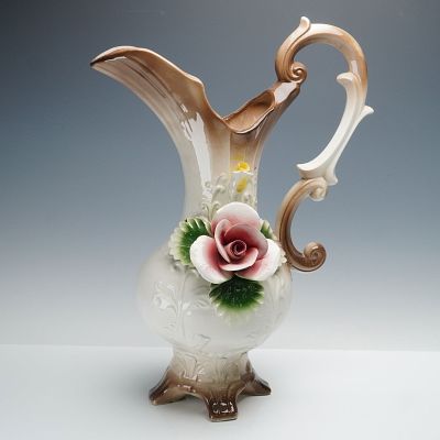 Capodimonte High Relief Floral Porcelain Pitcher. Capodimonte porcelain pitcher, hand-crafted in 
