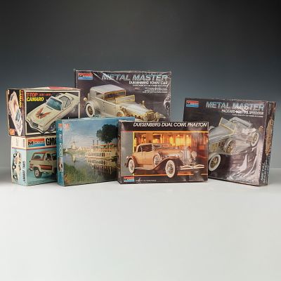 6pc Automotive Model Kits and Puzzle. A group of six vintage model kits and puzzles, featuring 