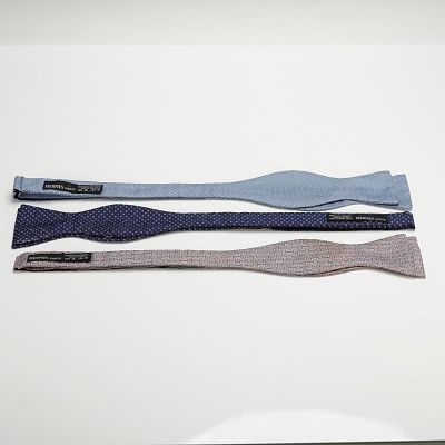 3pc Hermes Silk Bow Ties. This group includes three Hermes bow ties in assorted woven patterns. 