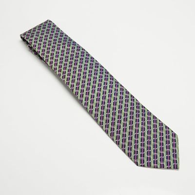 Hermes Multicolor Pattern Necktie. This necktie is woven in a repeating multicolor pattern 